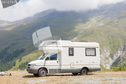 Image of Camper van parked high in the mountains