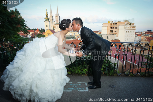 Image of Newlyweds kissing