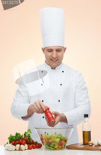 Image of happy male chef cook cooking food