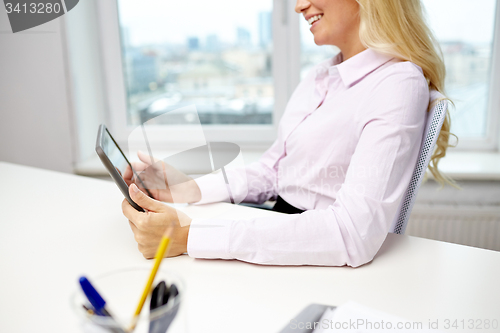 Image of smiling business woman or student with tablet pc