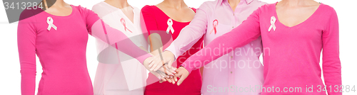 Image of close up of women with cancer awareness ribbons