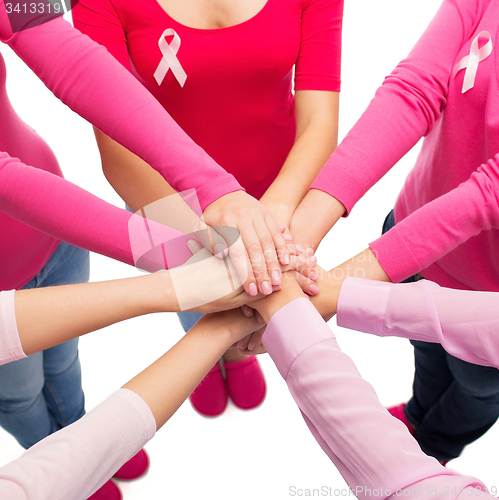 Image of close up of women with cancer awareness ribbons