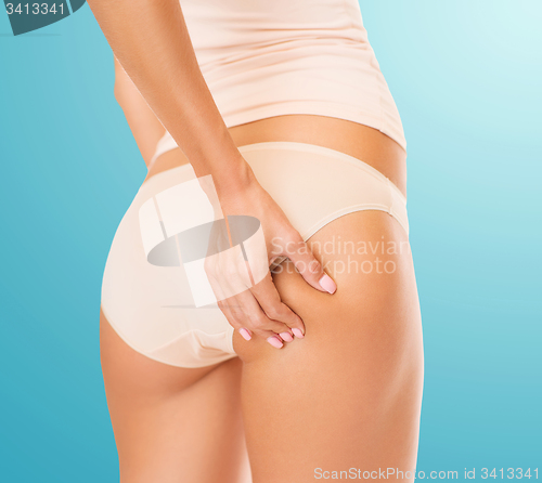 Image of woman in cotton underwear showing slimming concept