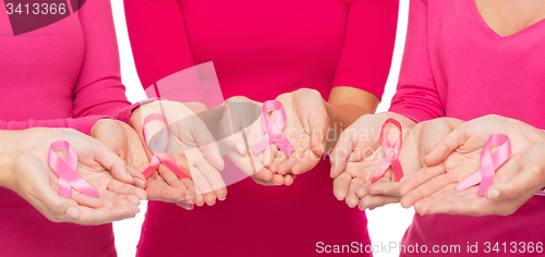 Image of close up of women with cancer awareness ribbons