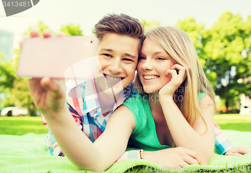 Image of smiling couple in park