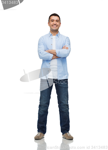 Image of smiling man with crossed arms