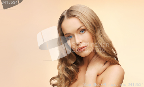 Image of beautiful woman face with long blond hair