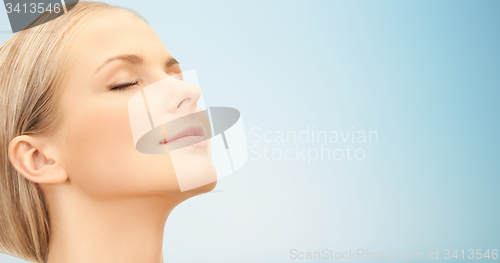 Image of beautiful young woman face