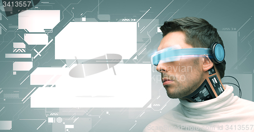 Image of man with futuristic glasses and sensors