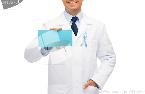 Image of happy doctor with prostate cancer awareness ribbon