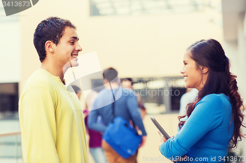 Image of group of smiling students tablet pc computer