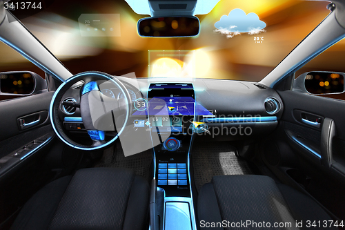 Image of car salon with navigation system and meteo sensors