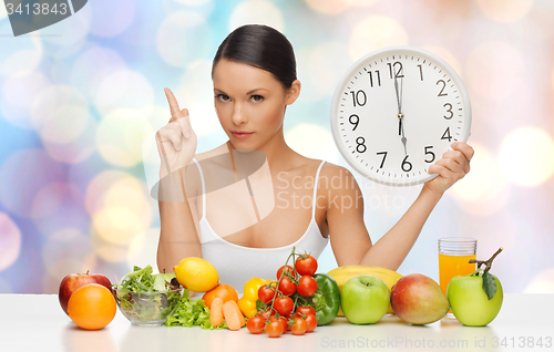 Image of woman with healthy food and clock warning