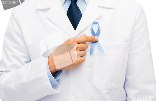 Image of doctor hand with prostate cancer awareness ribbon