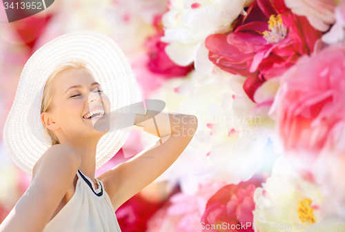 Image of beautiful woman enjoying summer outdoors