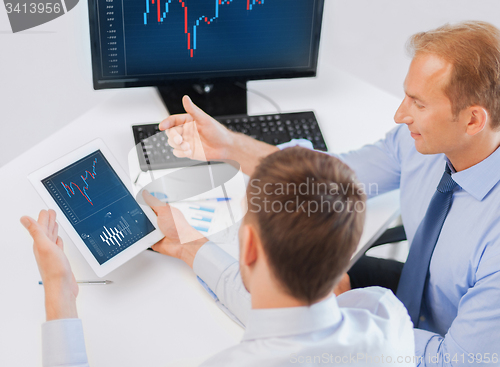 Image of businessmen with notebook and tablet pc