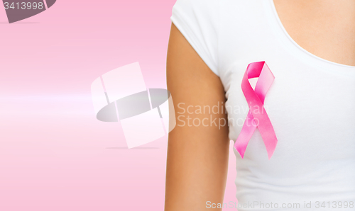 Image of woman with pink cancer awareness ribbon