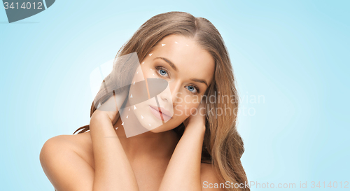 Image of beautiful woman face with long blond hair