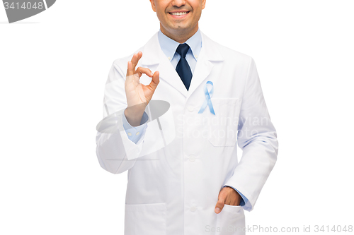 Image of happy doctor with prostate cancer awareness ribbon