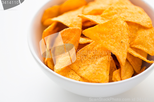 Image of close up of corn crisps or nachos in bowl