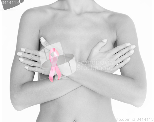 Image of naked woman with breast cancer awareness ribbon