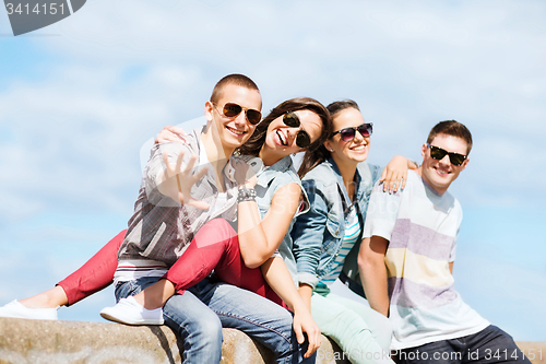 Image of group of teenagers hanging out