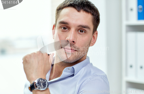 Image of portrait of businessman in office