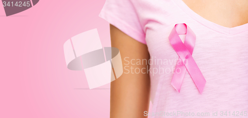 Image of close up of woman with cancer awareness ribbon