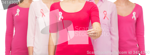 Image of close up of women with cancer awareness ribbons