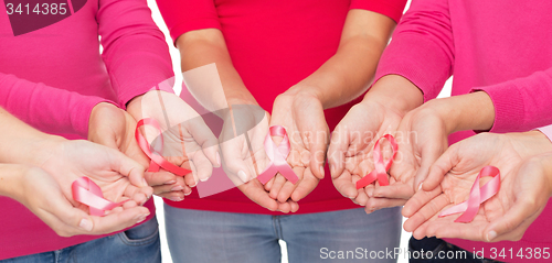 Image of close up of women with cancer awareness ribbons