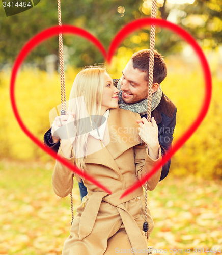 Image of romantic couple in the autumn park