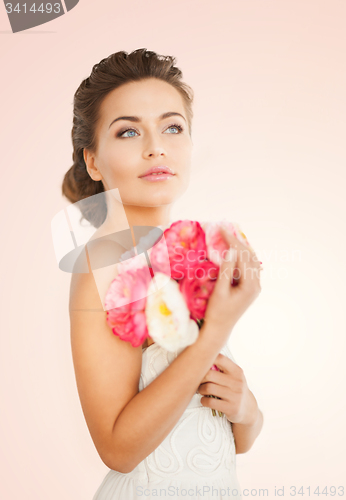 Image of woman with bouquet of flowers