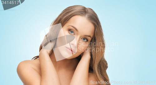 Image of beautiful woman face with long blond hair