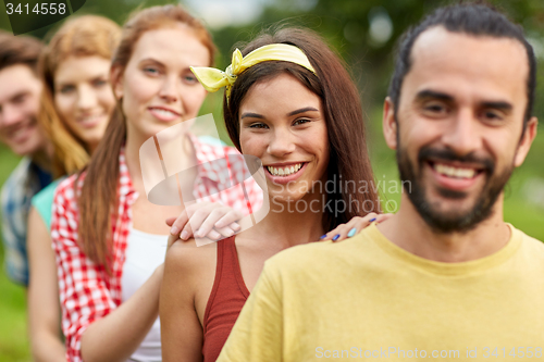 Image of group of smiling friends outdoors