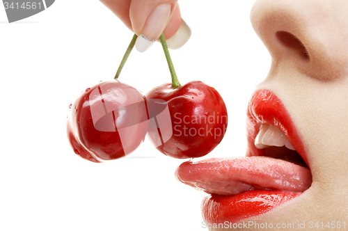 Image of cherry, lips and tongue