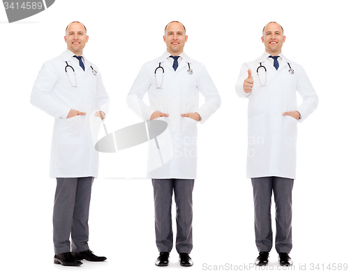 Image of happy doctors with stethoscope showing thumbs up