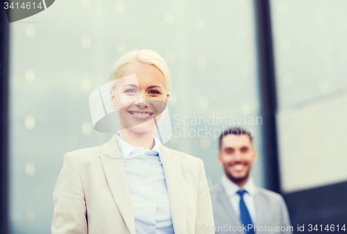 Image of close up of smiling businessmen