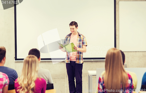 Image of group of smiling students in classroom