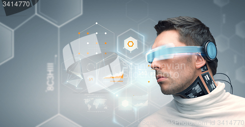 Image of man with futuristic glasses and sensors