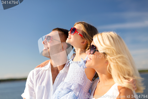 Image of happy family with blue sky