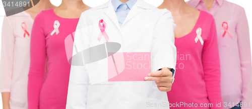 Image of close up of women with cancer awareness ribbons