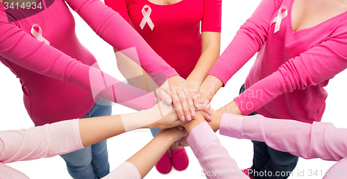 Image of close up of women with cancer awareness ribbons