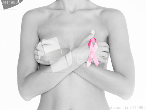 Image of naked woman with breast cancer awareness ribbon