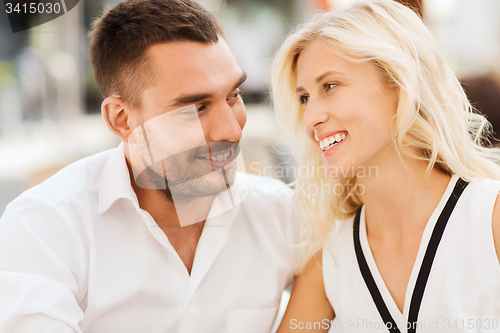 Image of smiling happy couple outdoors