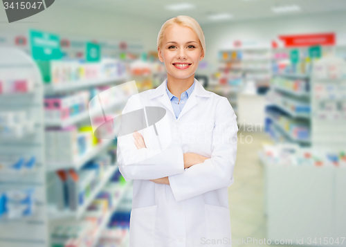 Image of young woman pharmacist drugstore or pharmacy