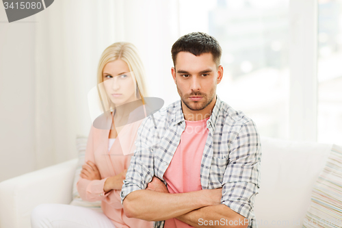 Image of unhappy couple having argument at home