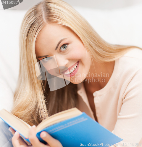 Image of woman reading book