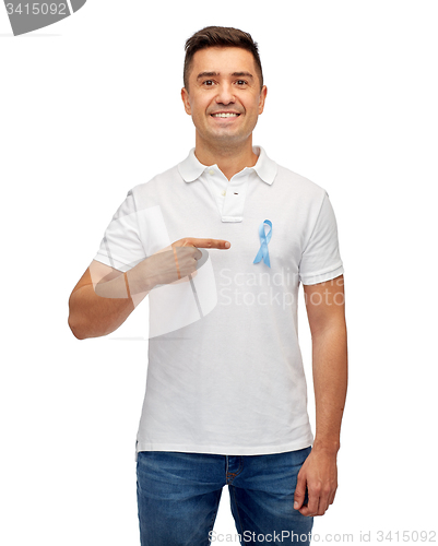 Image of smiling man with prostate cancer awareness ribbon