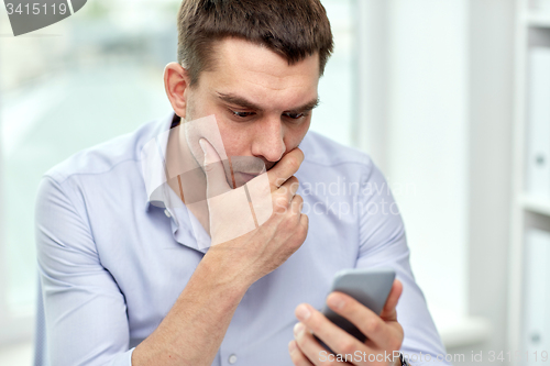 Image of close up of businessman with smartphone