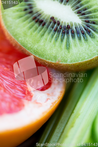 Image of close up of ripe kiwi and grapefruit slices